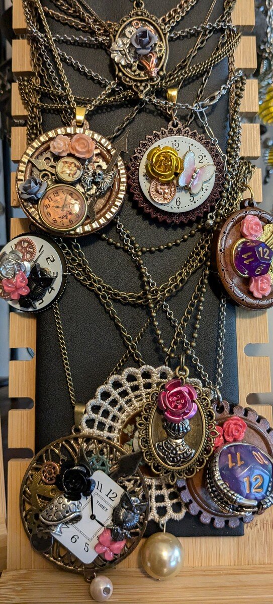 Steampunk clock pendants with roses and filigree