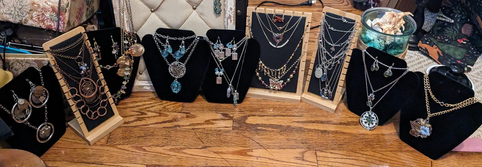 The Lore Faire booth — handcrafted jewelry arrayed across the display table