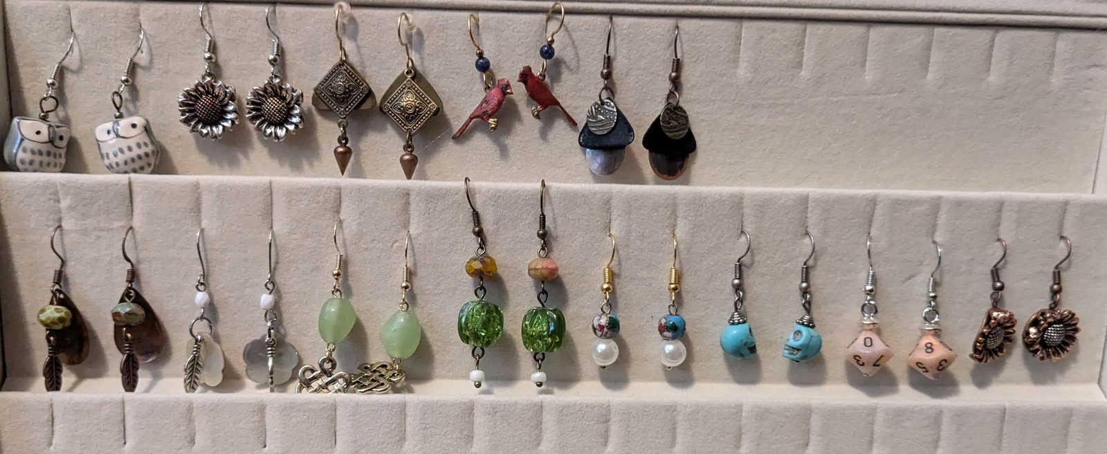 A display of dragon pendants and charms